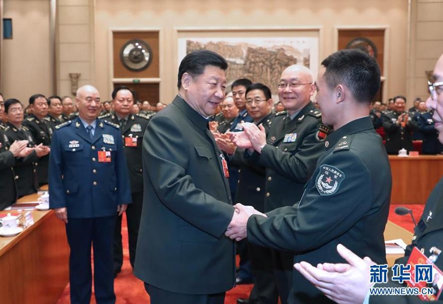  3月12日上午，中共中央總書記、國家主席、中央軍委主席習近平出席十三屆全國人大一次會議解放軍和武警部隊代表團全體會議。