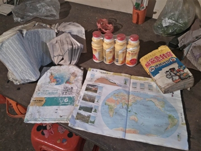  孩子野外求生時帶的書本和營養快線