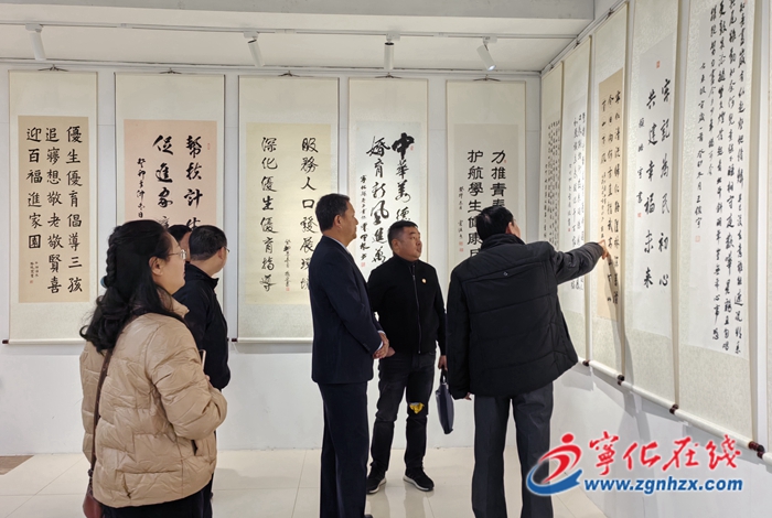 寧化縣“倡新型婚育文化·建和諧幸福家庭”元旦書畫作品展開幕