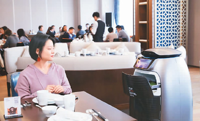 刷臉開房門機(jī)器人送餐 阿里首家未來酒店迎客